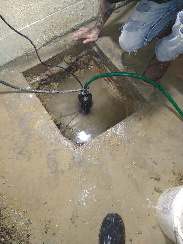 Sump pump and line installation2a